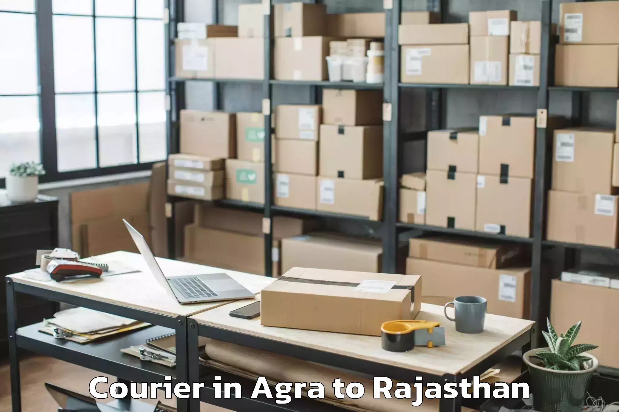 Book Agra to Kherli Courier Online